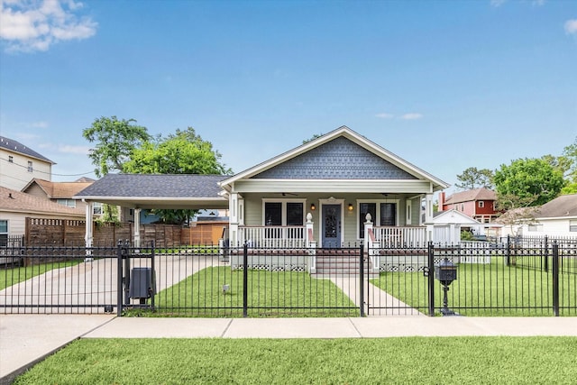 view of front of house with a gate, covered porch, and a front yard