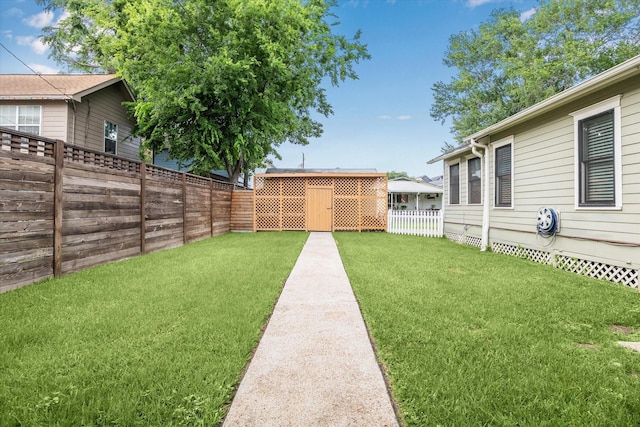 view of yard with a fenced backyard