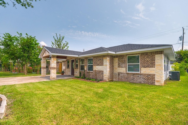 single story home featuring central air condition unit, a front lawn, roof with shingles, and brick siding