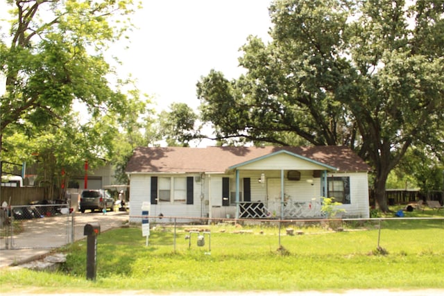 2014 Kowis St, Houston, TX 77093 - ranch-style house with a front yard, a fenced front yard, and covered porch