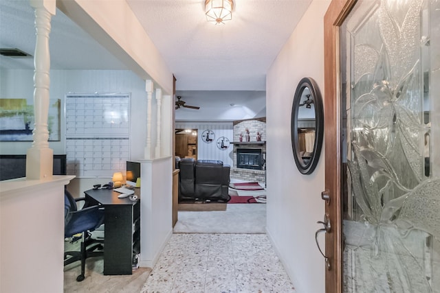 corridor with baseboards and visible vents