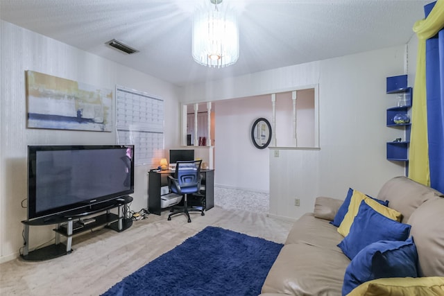 carpeted living area with visible vents