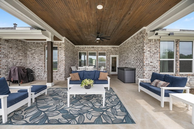 view of patio featuring ceiling fan and an outdoor living space