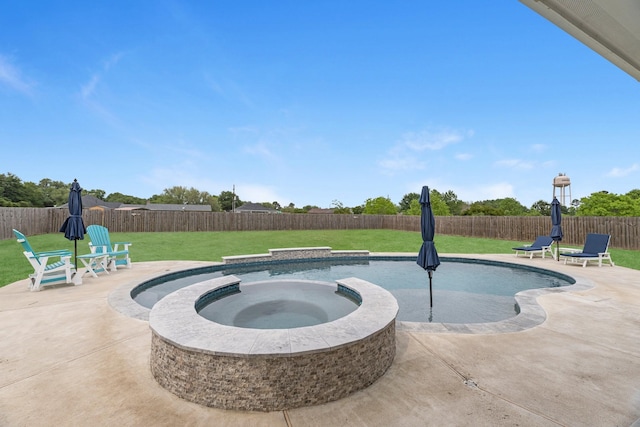 view of pool featuring a lawn, a fenced backyard, a patio area, and a pool with connected hot tub