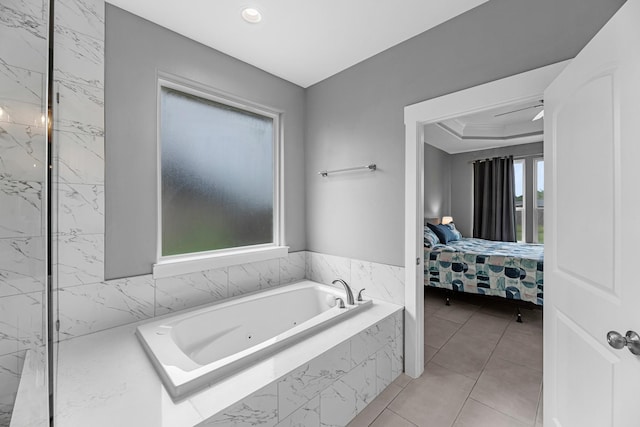 bathroom featuring connected bathroom, a whirlpool tub, tile patterned floors, and recessed lighting