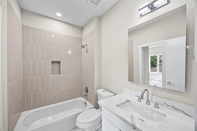 861 Prosper St, Houston, TX 77088 - full bath with shower / bathing tub combination, vanity, toilet, visible vents, and recessed lighting