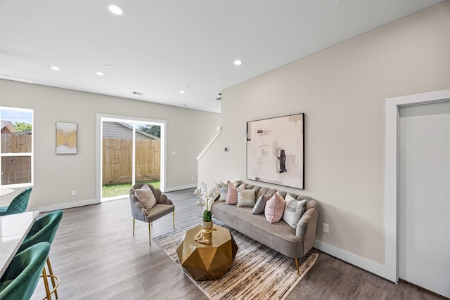 861 Prosper St, Houston, TX 77088 - living room featuring recessed lighting, wood finished floors, visible vents, and baseboards