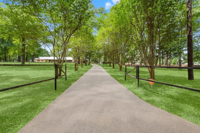 surrounding community with a yard