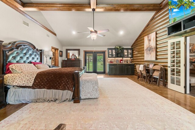 bedroom featuring high vaulted ceiling, log walls, french doors, and beamed ceiling