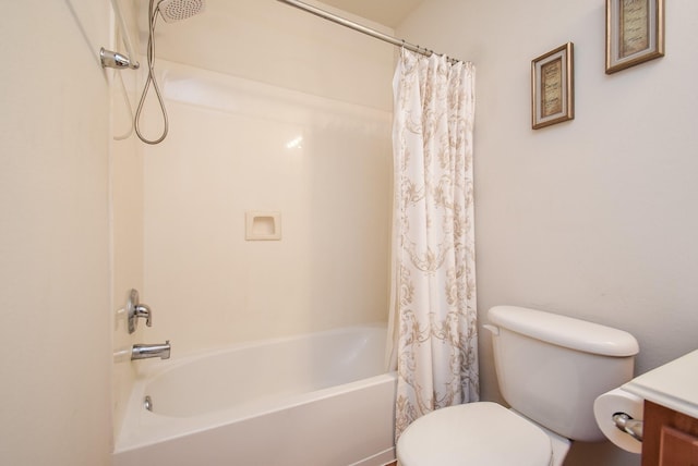 bathroom with vanity, shower / bathtub combination with curtain, and toilet