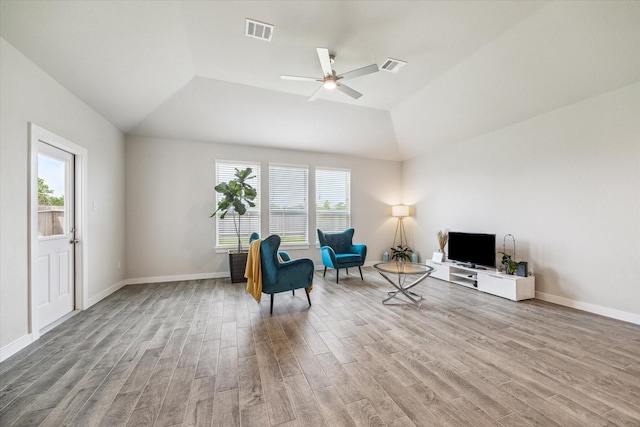 sitting room featuring visible vents, wood finished floors, and ceiling fan