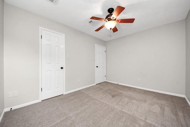 14110 Withersdale Dr, Houston, TX 77077 - unfurnished bedroom featuring carpet flooring, baseboards, and a ceiling fan