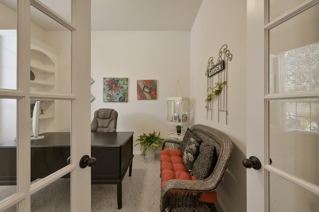 sitting room featuring baseboards