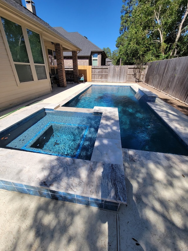 view of swimming pool featuring a fenced in pool and a fenced backyard