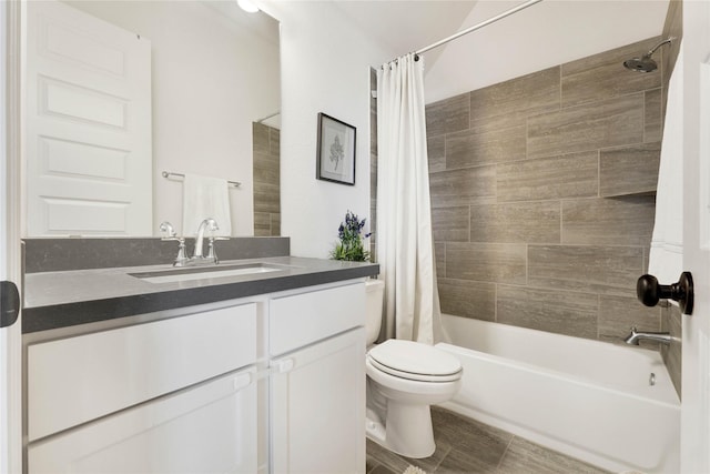bathroom featuring shower / bath combination with curtain, toilet, and vanity