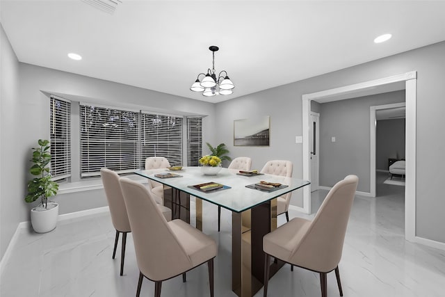 dining space with marble finish floor, an inviting chandelier, visible vents, and recessed lighting