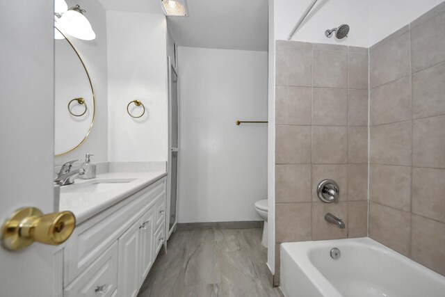 7954 Grove Ridge Dr, Houston, TX 77061 - full bathroom featuring shower / bathing tub combination, vanity, marble finish floor, and toilet