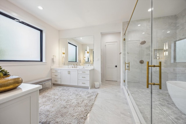 4016 Branard St, Houston, TX 77027 - full bathroom featuring recessed lighting, marble finish floor, vanity, a soaking tub, and a stall shower