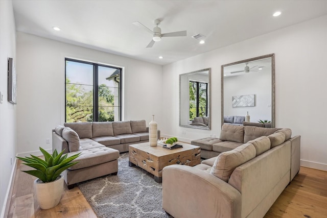 4016 Branard St, Houston, TX 77027 - living area with visible vents, a wealth of natural light, light wood-style floors, and ceiling fan