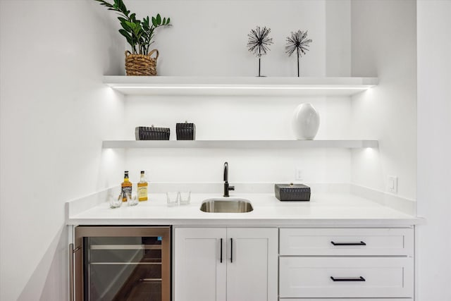 4016 Branard St, Houston, TX 77027 - bar featuring a sink, beverage cooler, and wet bar