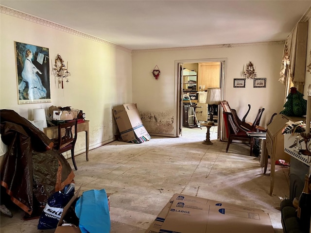 living area with crown molding
