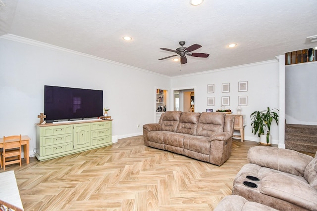 living area featuring baseboards, ceiling fan, ornamental molding, and recessed lighting