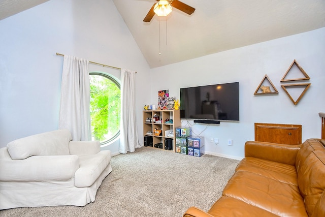 carpeted living area featuring high vaulted ceiling and ceiling fan