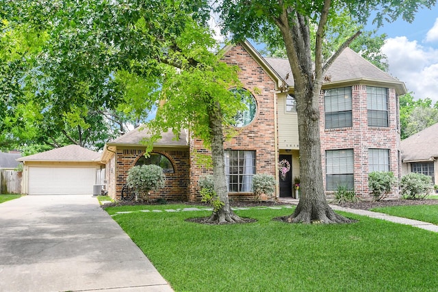 traditional home with a garage, a front lawn, cooling unit, brick siding, and a shingled roof