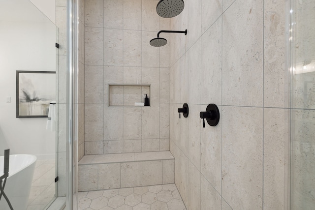 bathroom featuring a shower stall