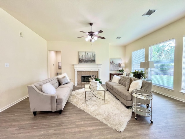 26936 Chateau Lake Dr, Kingwood, TX 77339 - living area featuring baseboards, visible vents, and dark wood finished floors