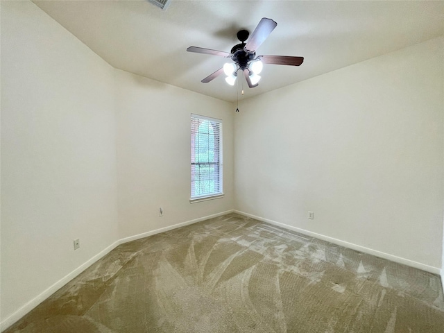 26936 Chateau Lake Dr, Kingwood, TX 77339 - carpeted spare room featuring visible vents, a ceiling fan, and baseboards