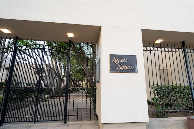 view of gate featuring fence