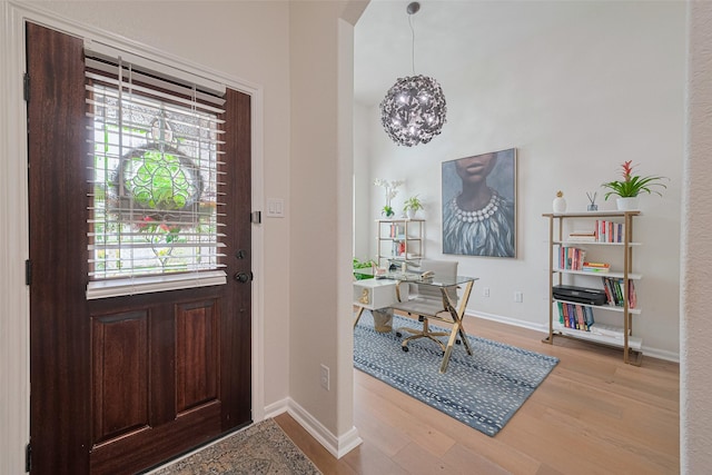 12205 Renewal Way, Houston, TX 77047 - entryway featuring wood finished floors, plenty of natural light, and baseboards