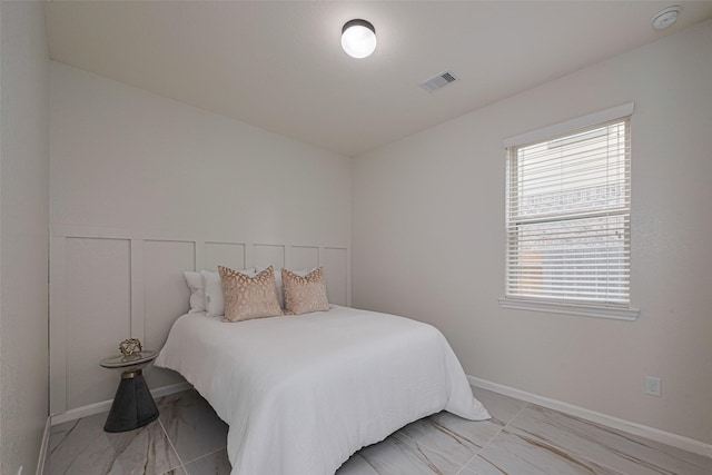 12205 Renewal Way, Houston, TX 77047 - bedroom with light marble finish floors and baseboards