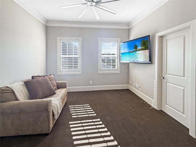 living room with dark carpet, ceiling fan, baseboards, and ornamental molding