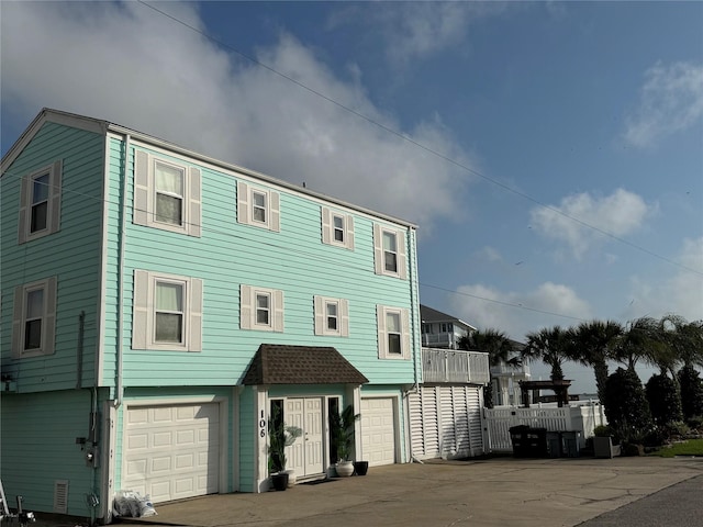 view of front of property featuring a garage