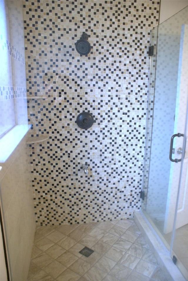 bathroom with a stall shower