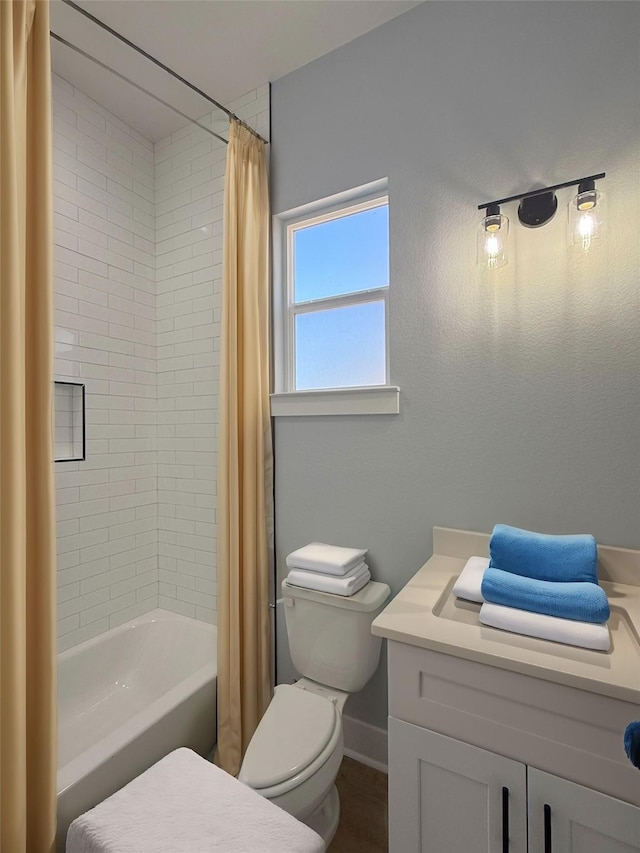 16366 Eastchase St, Montgomery, TX 77316 - bathroom featuring shower / bath combination with curtain, baseboards, and toilet