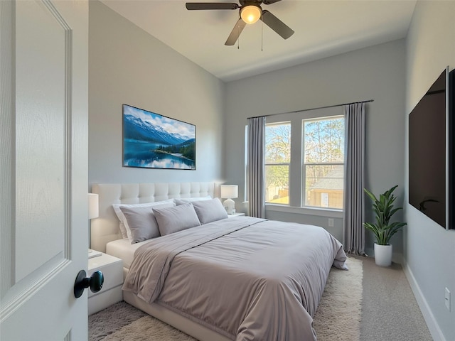 16366 Eastchase St, Montgomery, TX 77316 - bedroom featuring light carpet, a ceiling fan, and baseboards