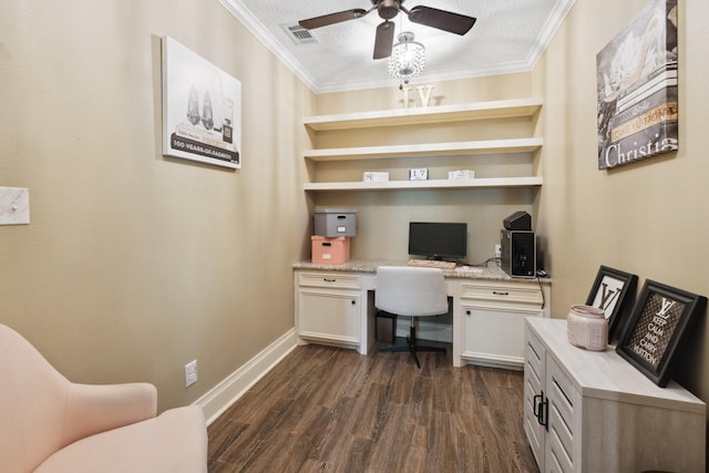 home office with crown molding, a ceiling fan, built in study area, and dark wood-style flooring