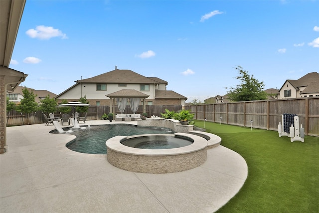 view of pool with a gazebo, a pool with connected hot tub, a fenced backyard, and a patio area
