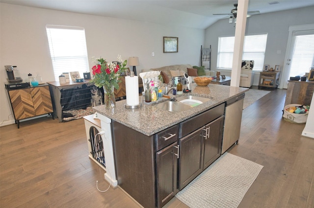 219 Lisa Marie Dr, Angleton, TX 77515 - kitchen featuring dark brown cabinets, vaulted ceiling, dishwasher, a ceiling fan, and open floor plan