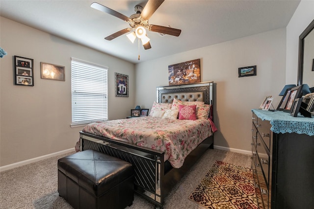2214 Del Mar Dr, Texas City, TX 77568 - carpeted bedroom with a ceiling fan and baseboards