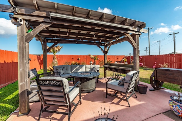 2214 Del Mar Dr, Texas City, TX 77568 - view of patio with a pergola, a fenced backyard, and an outdoor living space with a fire pit