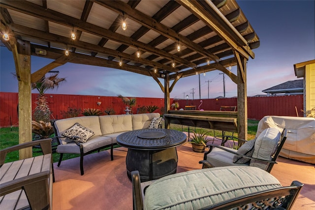2214 Del Mar Dr, Texas City, TX 77568 - view of patio with a fenced backyard and an outdoor living space with a fire pit