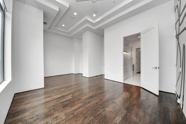 1512 Malone St, Houston, TX 77007 - unfurnished room featuring recessed lighting, a raised ceiling, ceiling fan, and wood finished floors