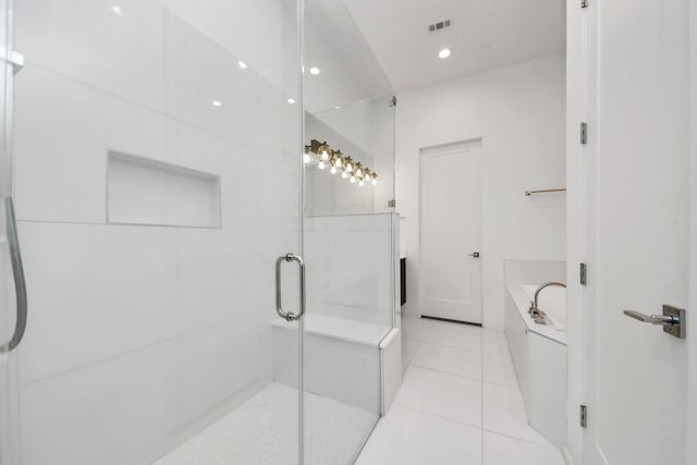 1512 Malone St, Houston, TX 77007 - bathroom with a stall shower, a bath, and tile patterned floors
