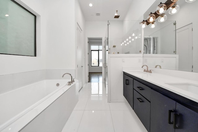 1512 Malone St, Houston, TX 77007 - bathroom with double vanity, a garden tub, tile patterned flooring, and a sink