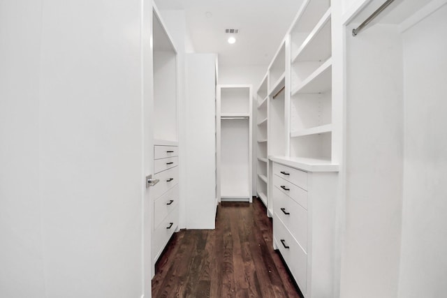 1512 Malone St, Houston, TX 77007 - walk in closet with visible vents and dark wood-type flooring