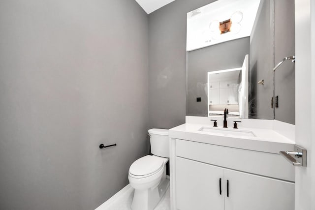1512 Malone St, Houston, TX 77007 - bathroom with toilet, vanity, and baseboards